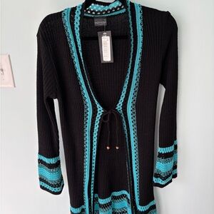 Gorgeous Black & turquoise sweater fits small to medium & close to knee length.